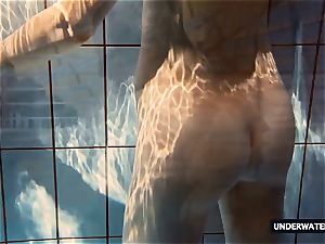 torrid ginormous breasted teenage Lera swimming in the pool